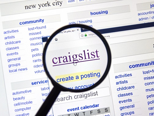 Craigslist listing under a magnifying glass